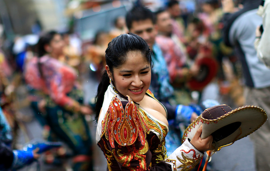 FOTOS|  Así fue el lluvioso Primer Carnaval de Santiago